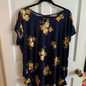 3X woman’s flutter sleeve floral top